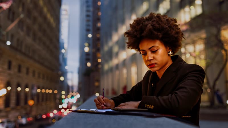 Finance Worker Preparing For Meeting